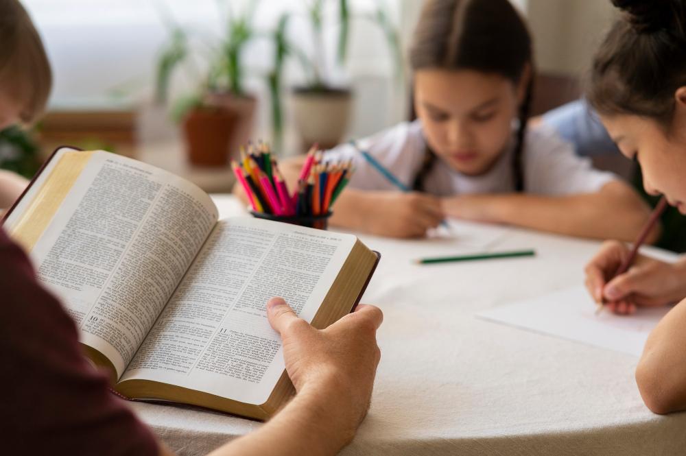 kid-reading-bible-in-class image Costa Mesa Christian Schools: High-Quality Education Close to Home